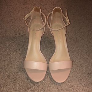 Size 7.5 Strappy open-toe pump. Only worn once!